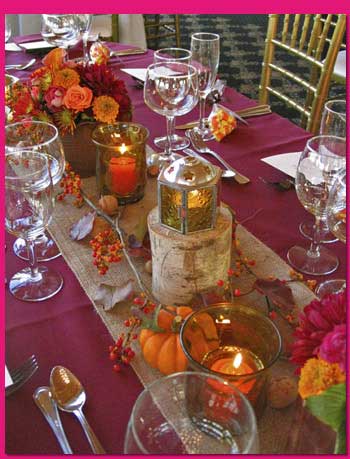شمع آرایی(ترئین میز با شمع و گل)
