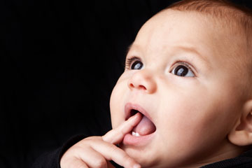 علایم در آوردن دندان,دندان درآوردن کودک و تب