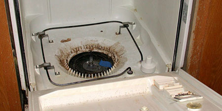 نحوه تمیز کردن ماشین ظرفشویی,محل تخلیه آب ماشین ظرفشویی
