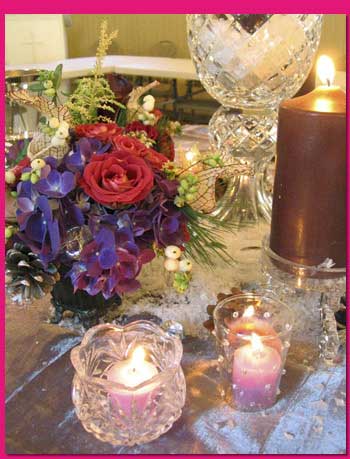 شمع آرایی(ترئین میز با شمع و گل)