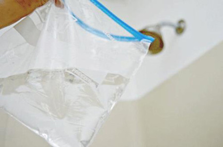 راهنمای تمیز کردن دوش حمام, از بین بردن رسوبات سر دوش