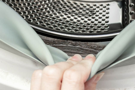 کپک ماشین لباسشویی,کپک ماشین لباسشویی رو خیلی راحت تمیز کنید,تمیز کردن کپک دور لاستیک ماشین لباسشویی