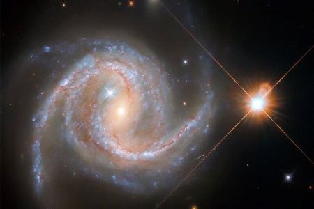 درخشش یک ستاره در کنار کهکشانی مارپیچی،اخبار علمی،خبرهای علمی