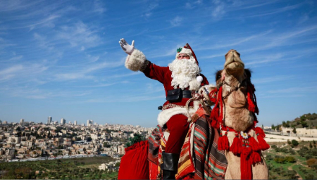 عکسهای جالب,عکسهای جذاب,بابانوئل شترسوار در شهر قدس