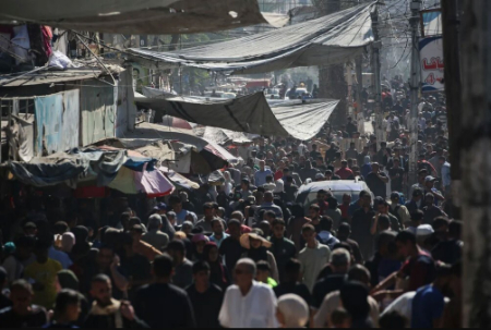 عکسهای جالب,عکسهای جذاب,شلوغی بازار اردوگاه نصیرات در شمال نوار غزه