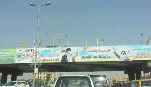 کتک کاری در پارلمان عراق بر سر نصب تصاویر رهبران ایران در بغداد