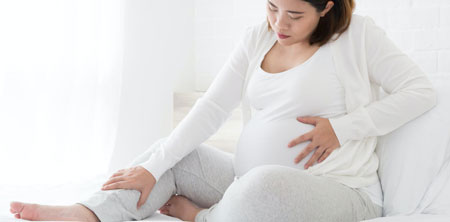 درد زیر شکم در بارداری, علت درد زیر شکم در اوایل بارداری, علت درد زیر شکم در بارداری